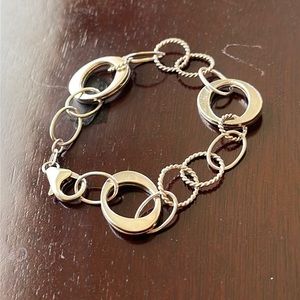 Fun vintage sterling silver .925 chain bracelet with varying size links. 7 in